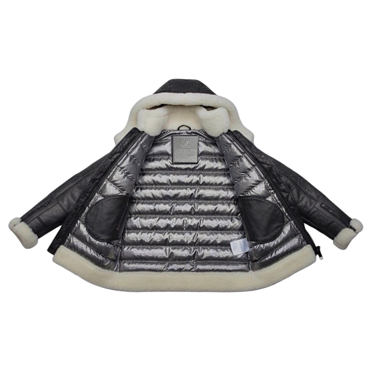 The Iconic x Luxury CANADA SANSAR CS Monogram Puffer Shearling Fur Coat.
Where Heritage Craft Meets Avant-Garde Luxury.